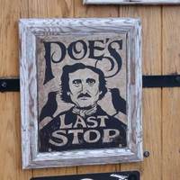 Poe's Last Stop sign at The Horse Saloon where he haunts